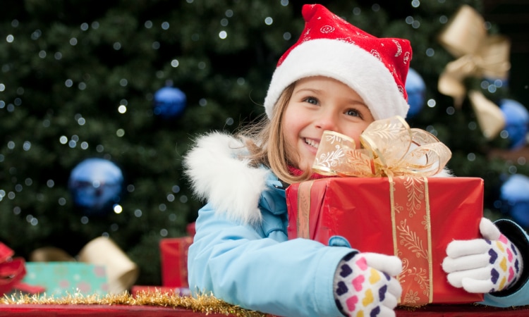 Regali di Natale per bambini: come portarli durante le vacanze